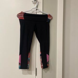 Stretched with the hanger. Floral and black pants.